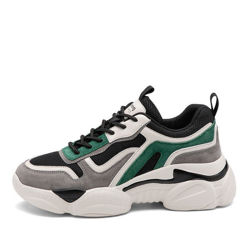 Multicolor sneaker with black, green, and gray design on a white background