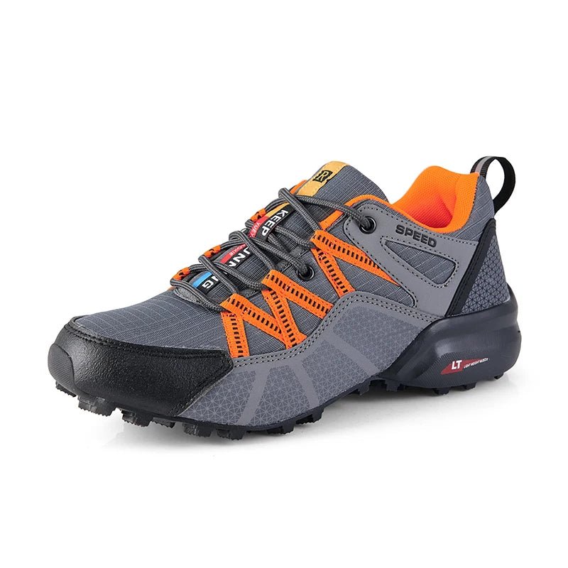 Outdoor trail sneakers for walking and light hiking, gray design with orange accents and anti-slip sole