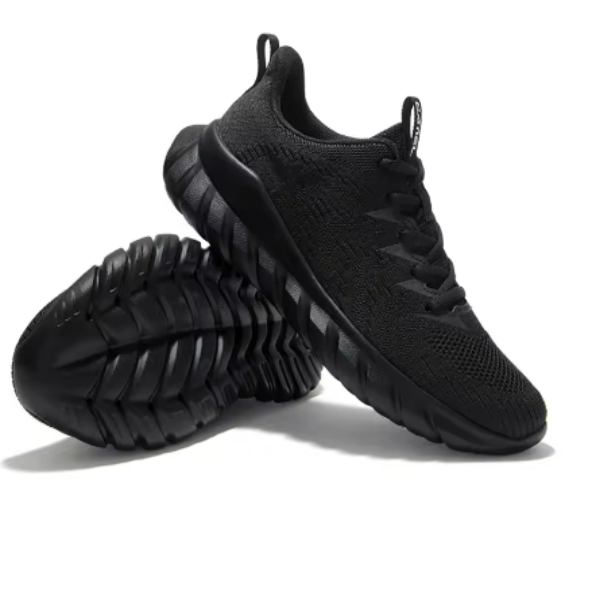 Black blade sole sneakers breathable athletic running shoes outsole view