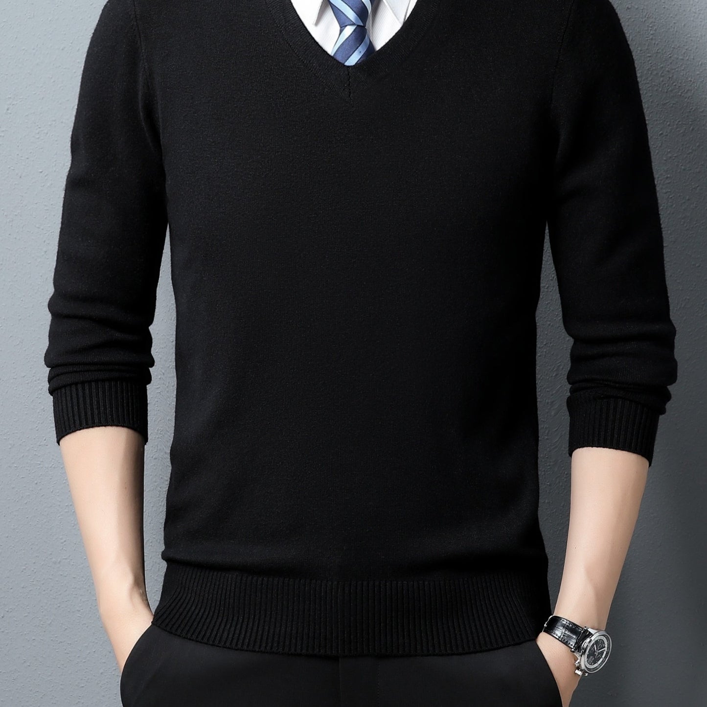 Black Men's Knitted V-neck Sweater worn by a person on a gray background