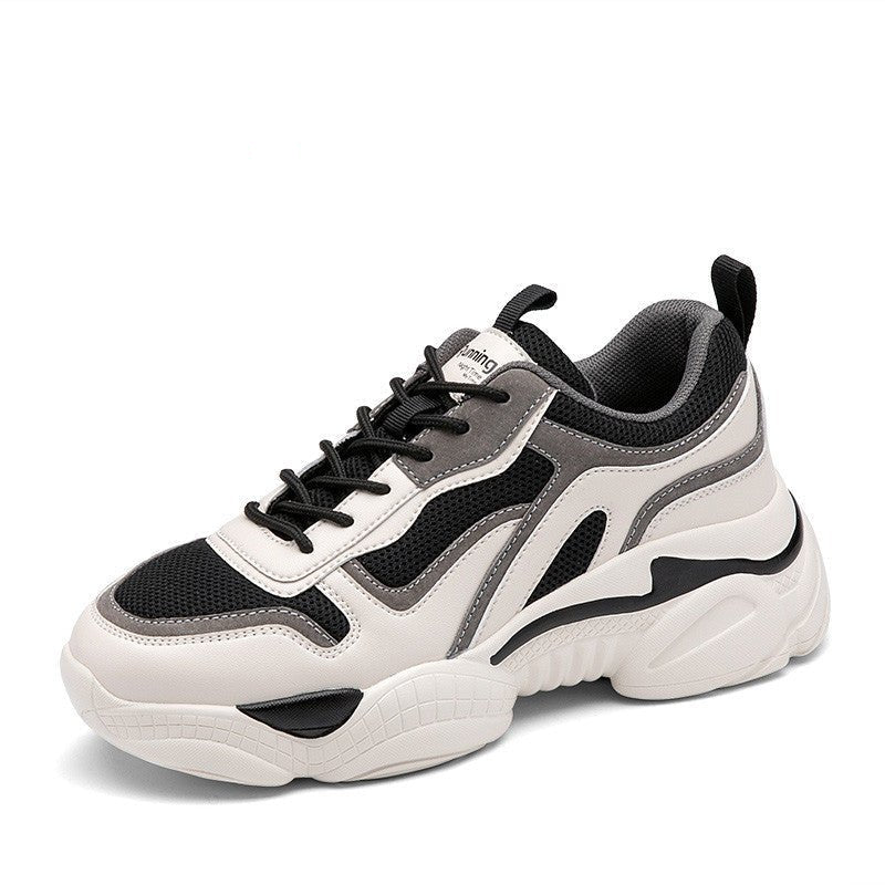White and black sneaker with brand logo on a white background