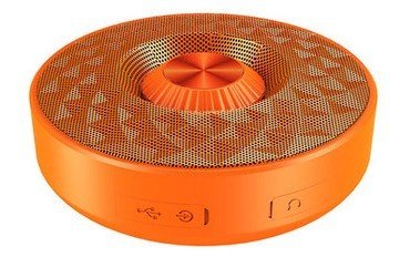 A compact and portable mini wireless Bluetooth speaker with a black color scheme, featuring a geometric pattern on the top surface and a metal grill.