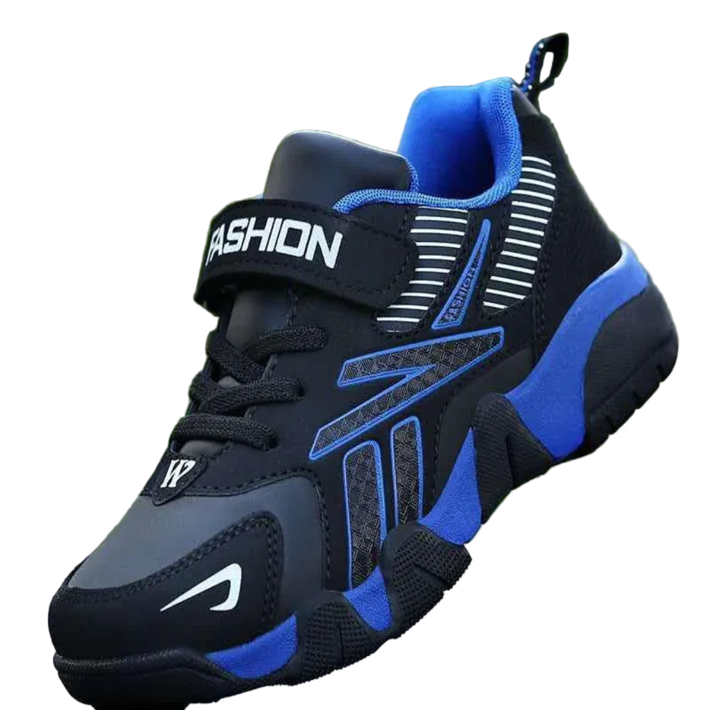 A pair of kids' sport sneakers with a black and white design, featuring a lace-up closure and the word 'FASHION' printed on the side.