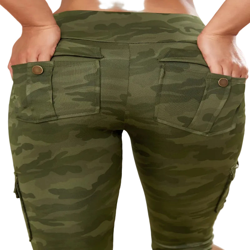 Green camouflage pants with pockets on a neutral background