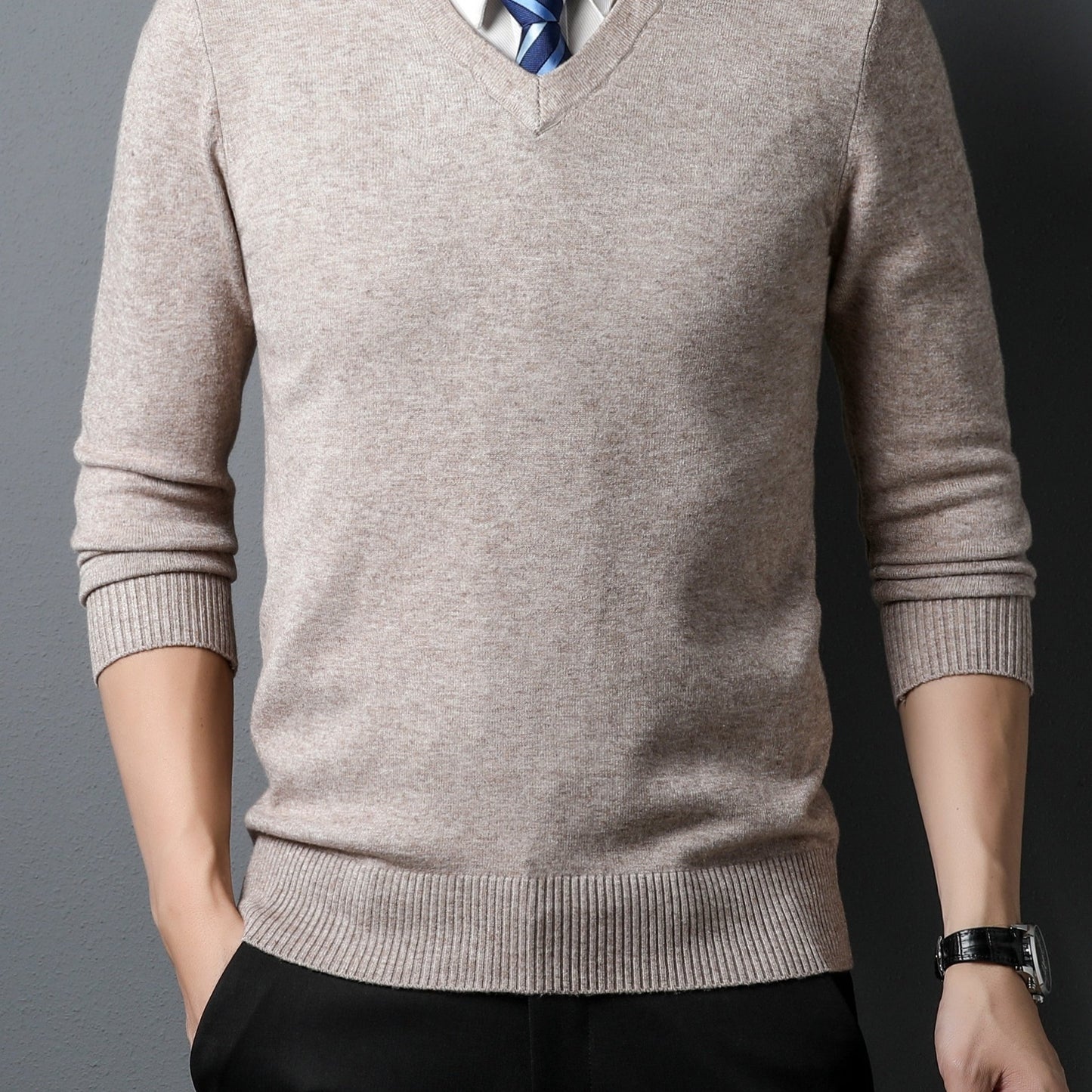 Beige Men's Knitted V-neck Sweater worn by a person on a gray background