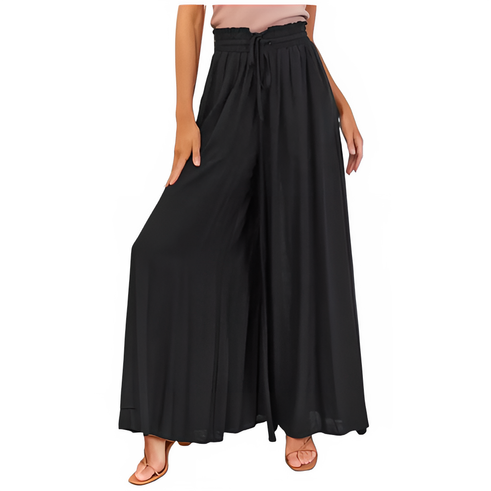 Black wide-leg pants worn by a person on a white background