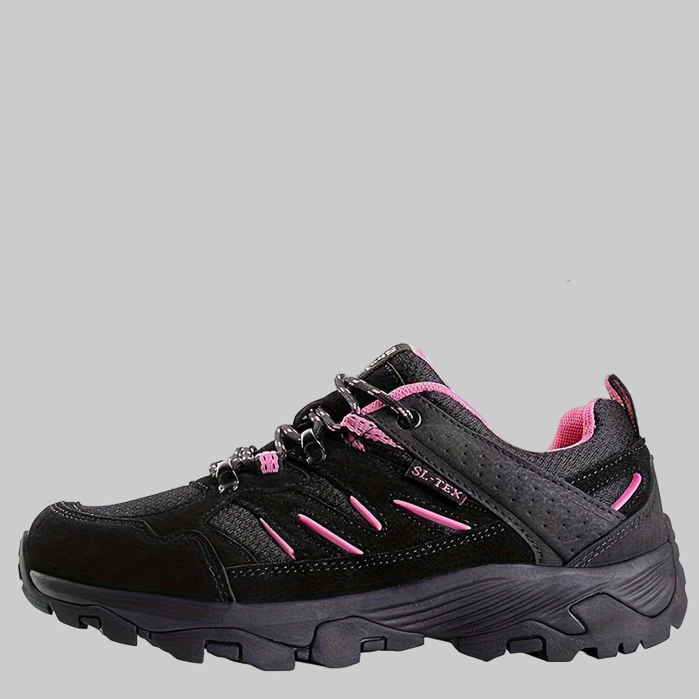 Black and pink women’s non-slip hiking shoes with features highlighted on a white background