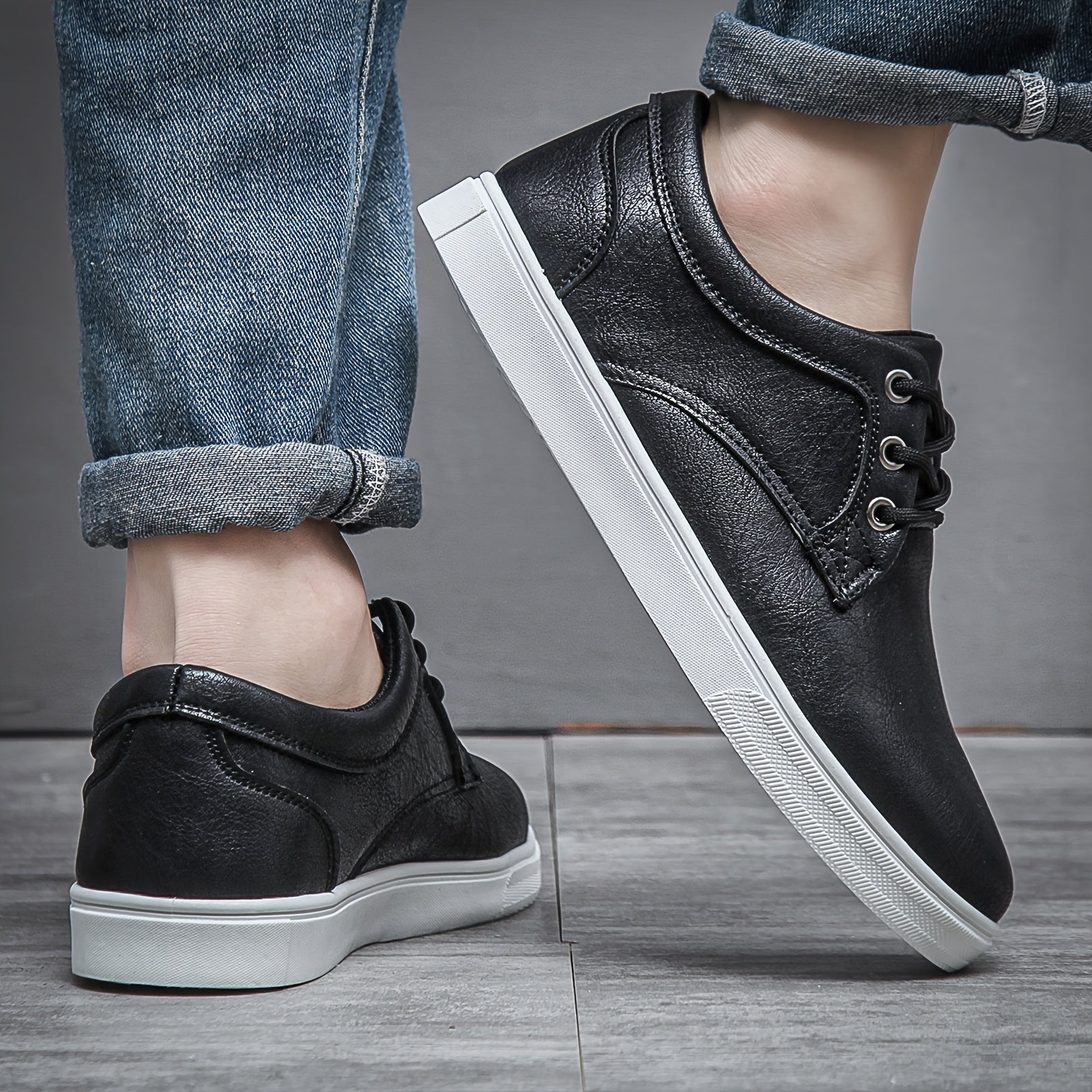 Modern men's PU leather skate shoes with a stylish and durable design.