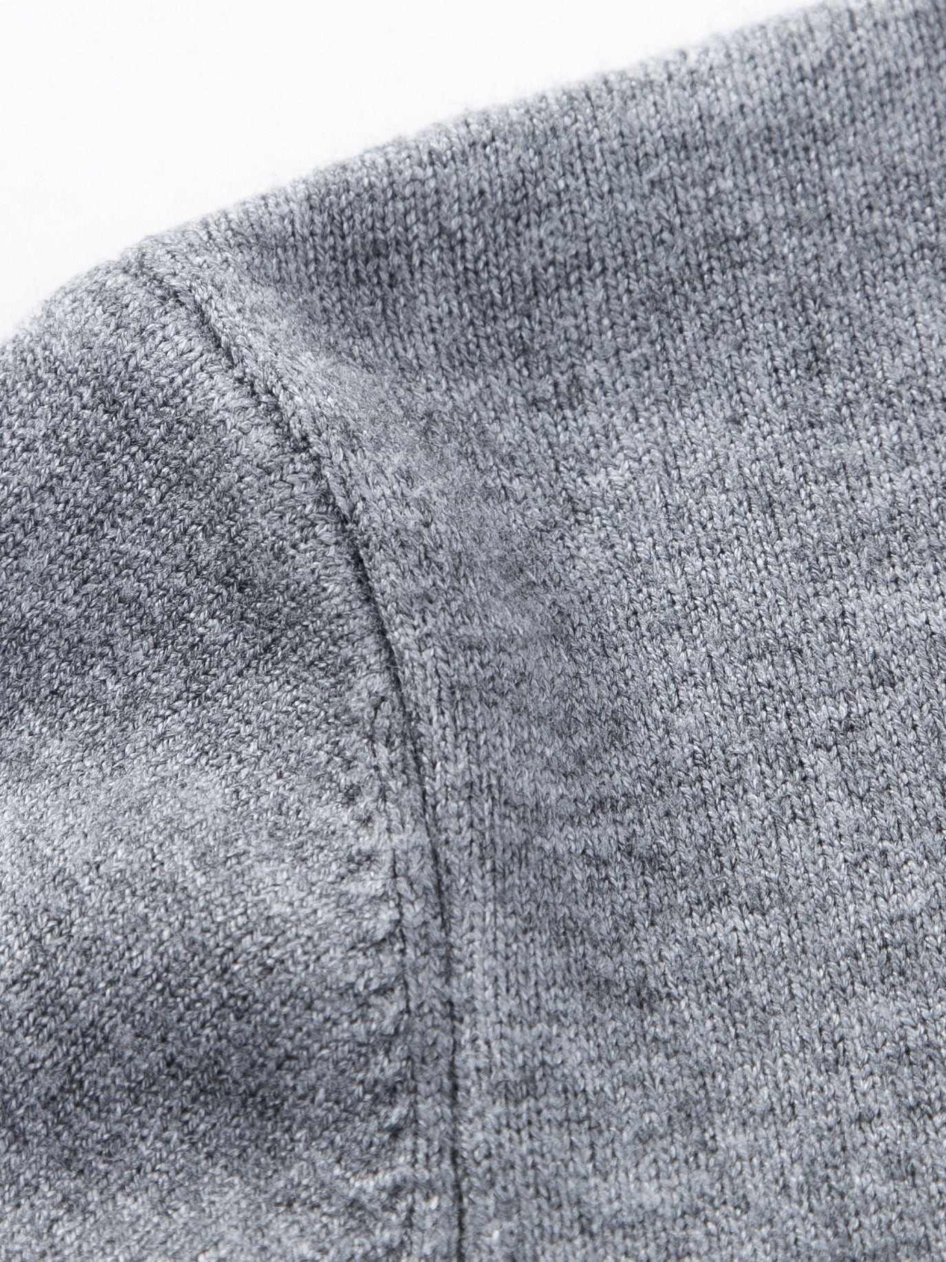 Close-up of a textured gray fabric surface