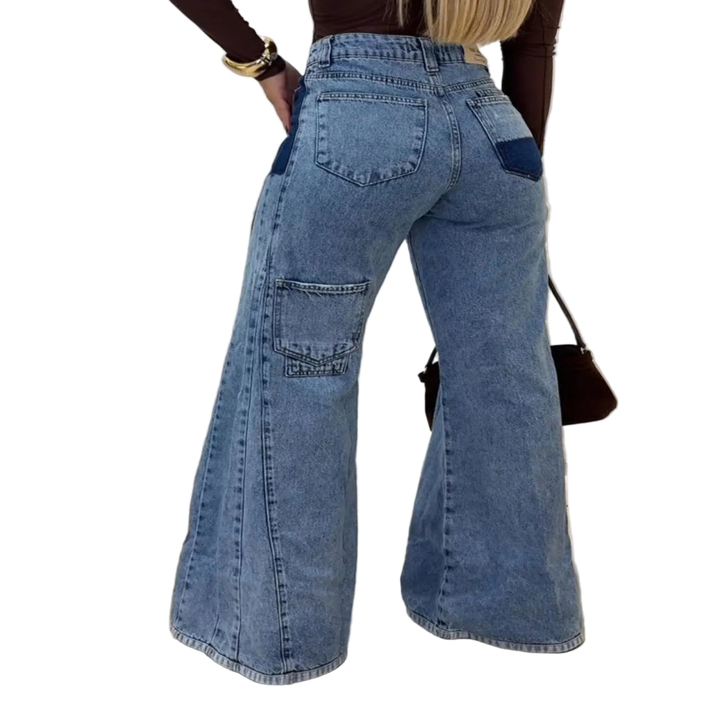 Women's high waisted flare jeans in light wash denim – full length silhouette