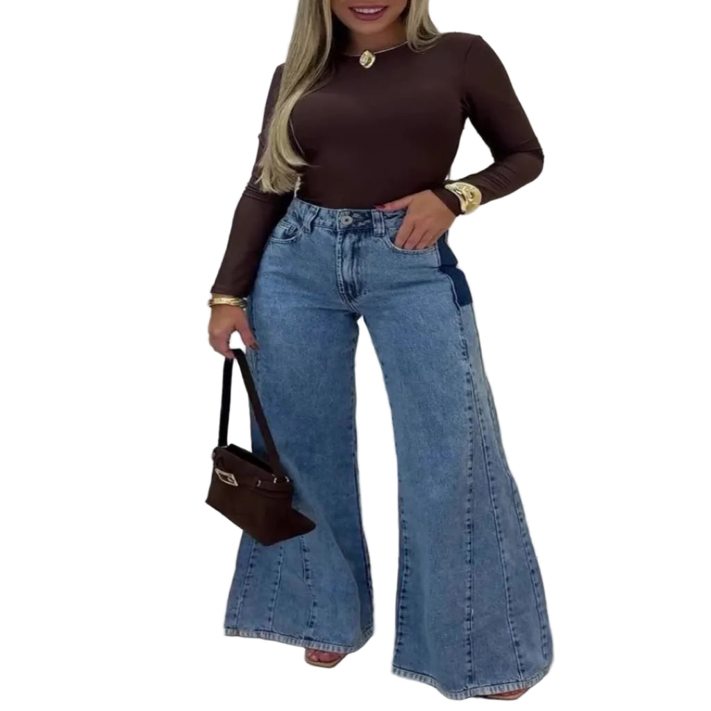 Women's high waisted flare jeans in light wash denim – full length silhouette