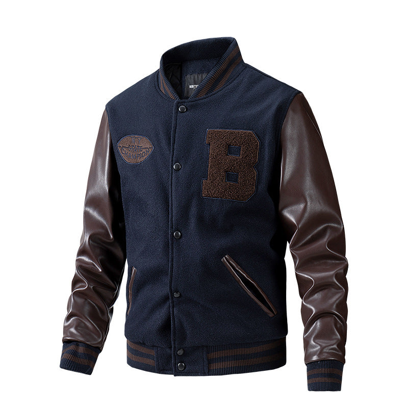 Navy blue varsity jacket with brown leather sleeves on a white background