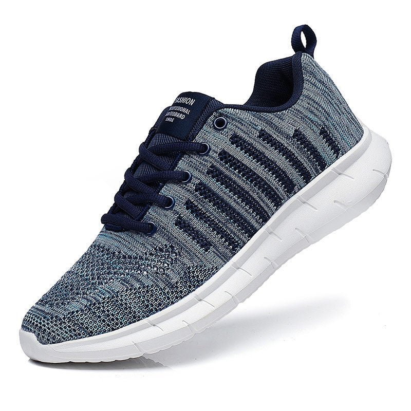 Gray and navy running shoe on a white background