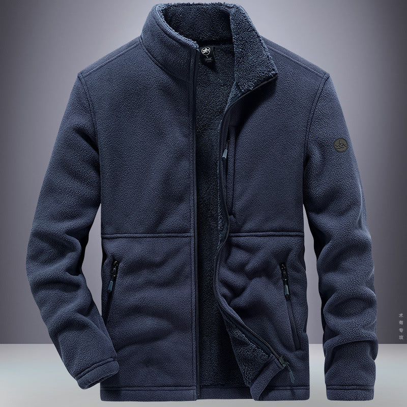 Blue fleece jacket on a gray background