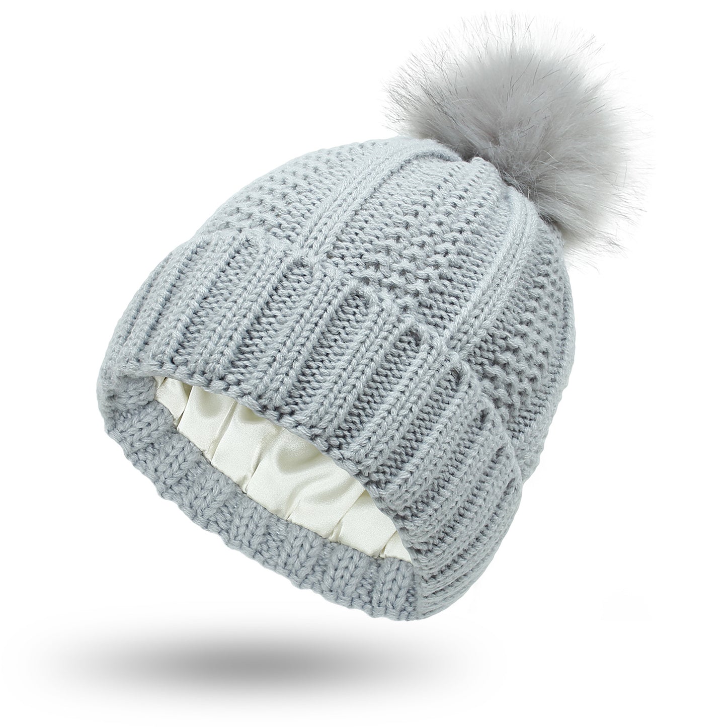 Ensure all product images have descriptive alt text, such as "Women's satin-lined knit beanie with faux fur pom