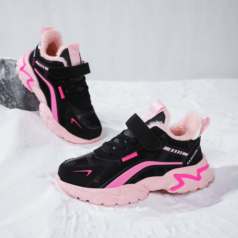 Black and pink children's winter boots with fluffy lining on a white background