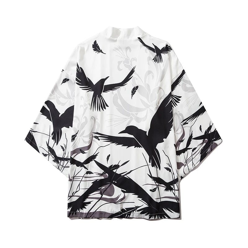 White garment with black bird pattern on a white background