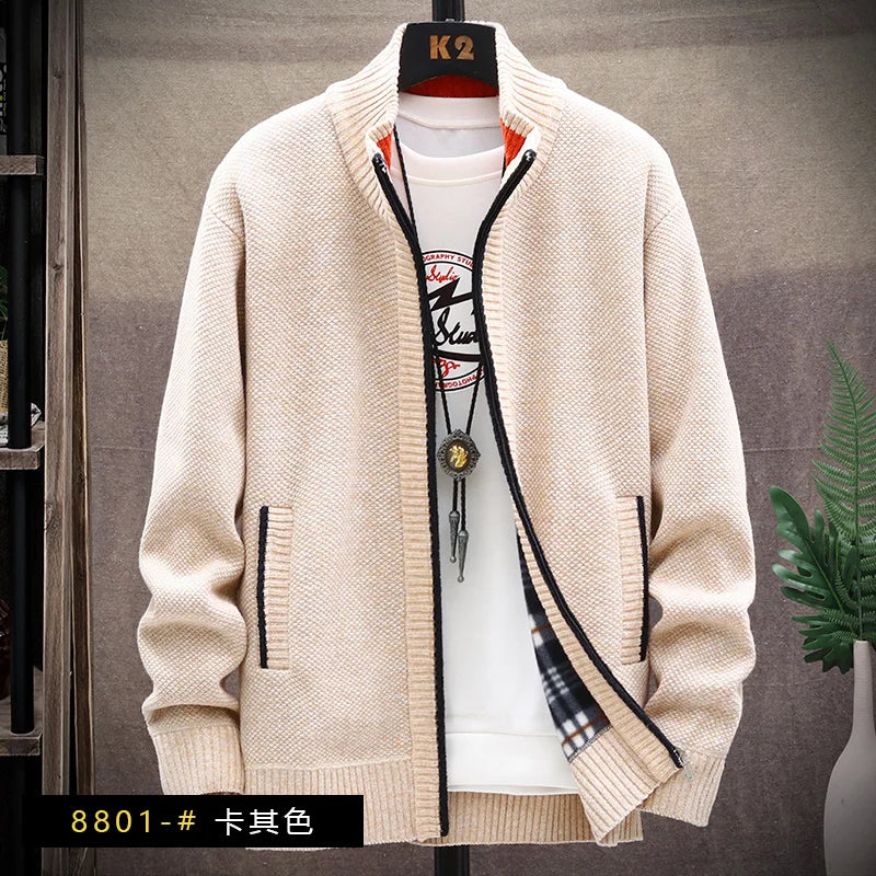 Beige cardigan with black accents on a mannequin against a neutral background