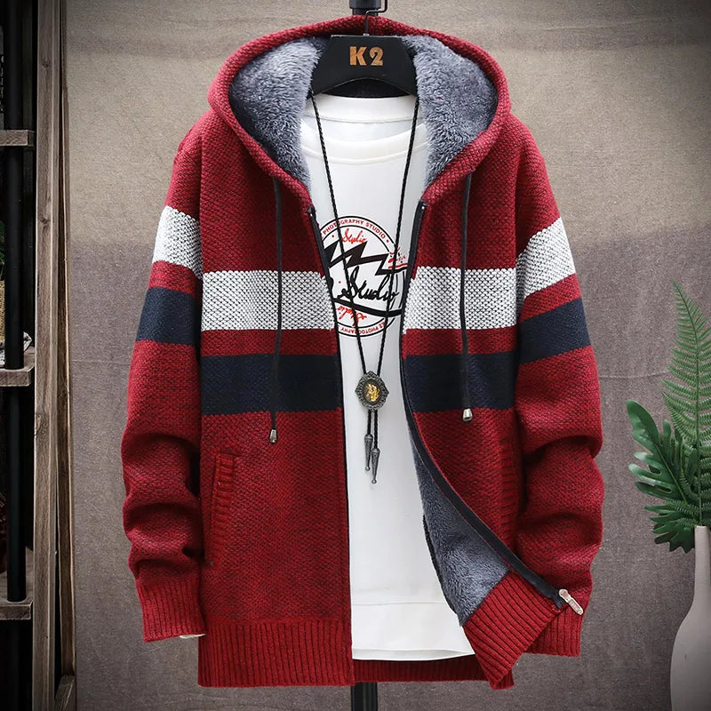 Red and gray striped hoodie on a hanger with a white shirt underneath.