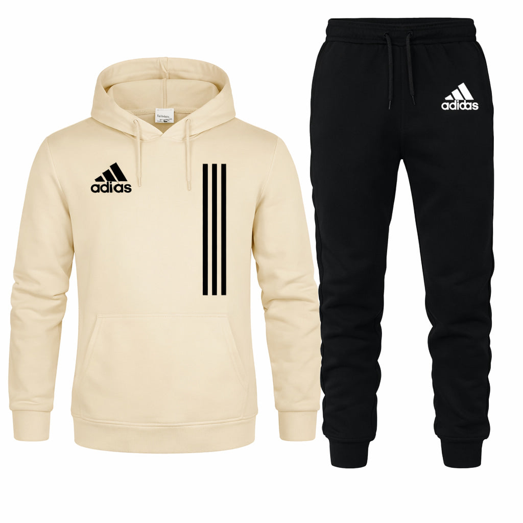 Beige hoodie and black tracksuit with Adidas logo on a white background