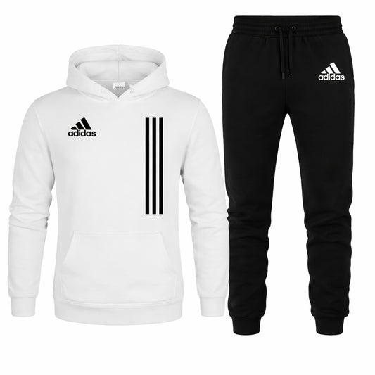 White hoodie and black tracksuit with Adidas logo on a white background