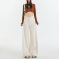 women wearing wide leg flare jeans high waist vintage outfit
