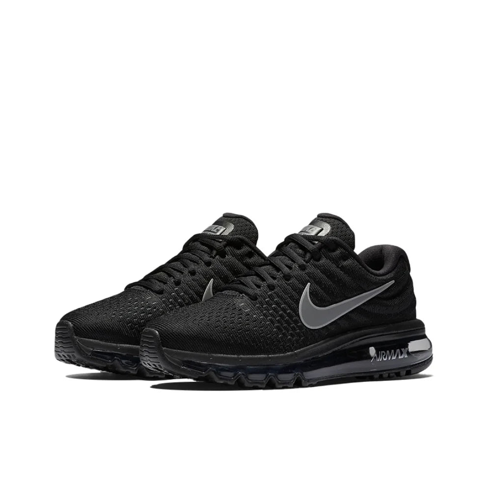 Black Nike Alpha Trainer 6 Air Cushion Shoes with a Nike logo on a white background