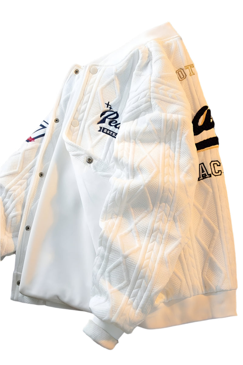 White cable-knit varsity jacket for kids – soft, warm, and stylish outerwear with ribbed cuffs and embroidered patches