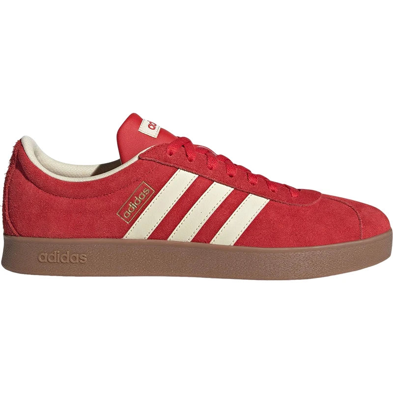 Red Adidas sneaker with white stripes on a white background
