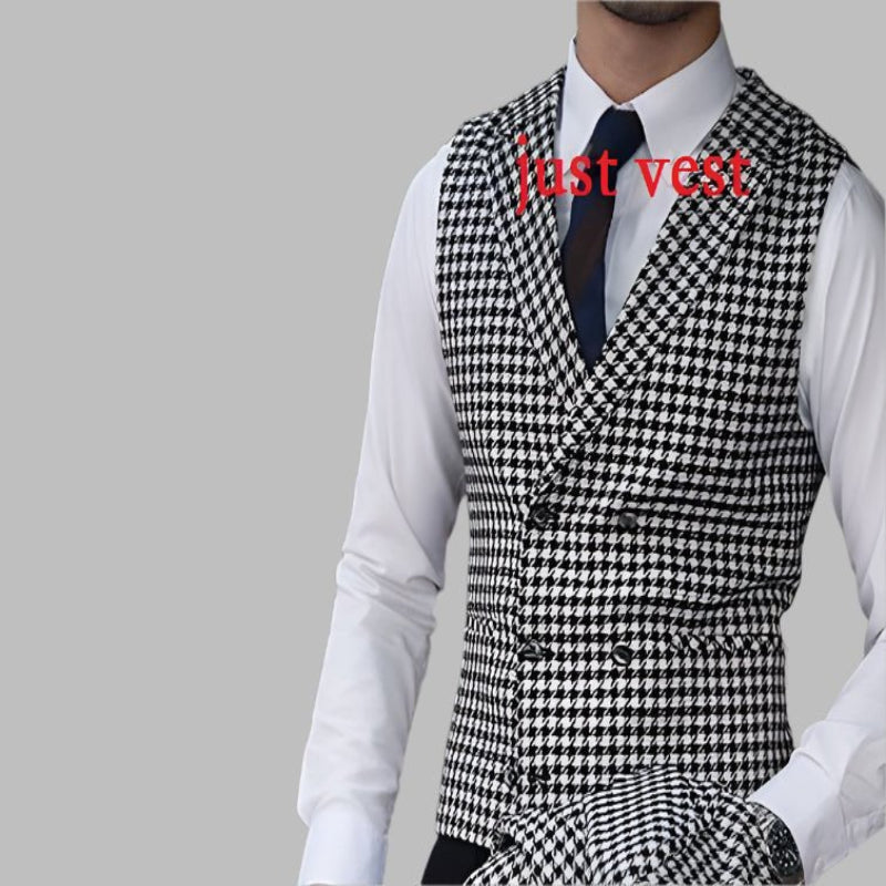 Houndstooth patterned vest worn by a person on a gray background