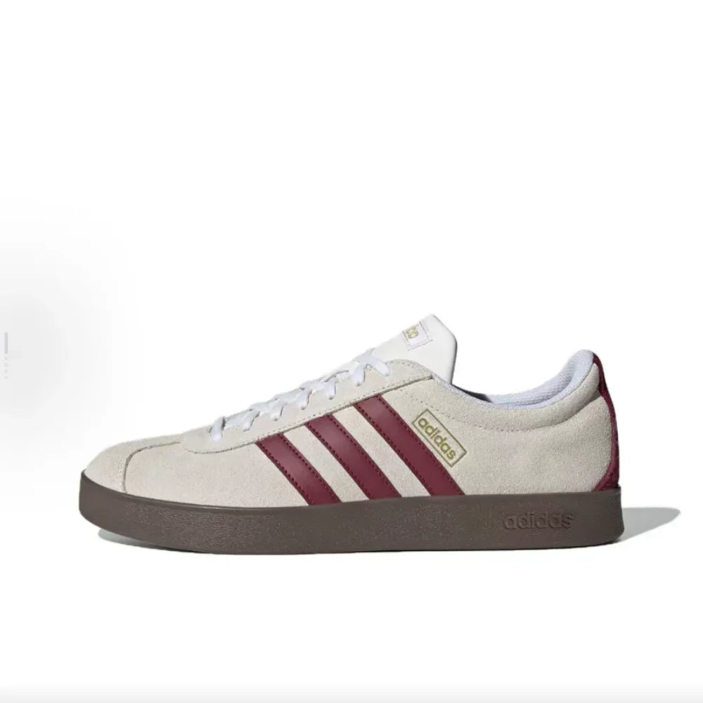 Beige Retro Low Top Sneakers with red stripes on a white background
