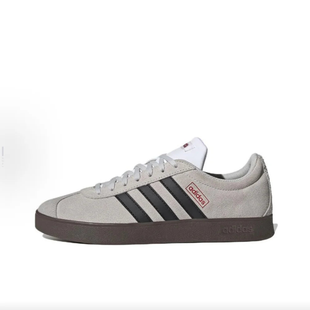 Gray Retro Low Top Sneakers with black stripes on a white background