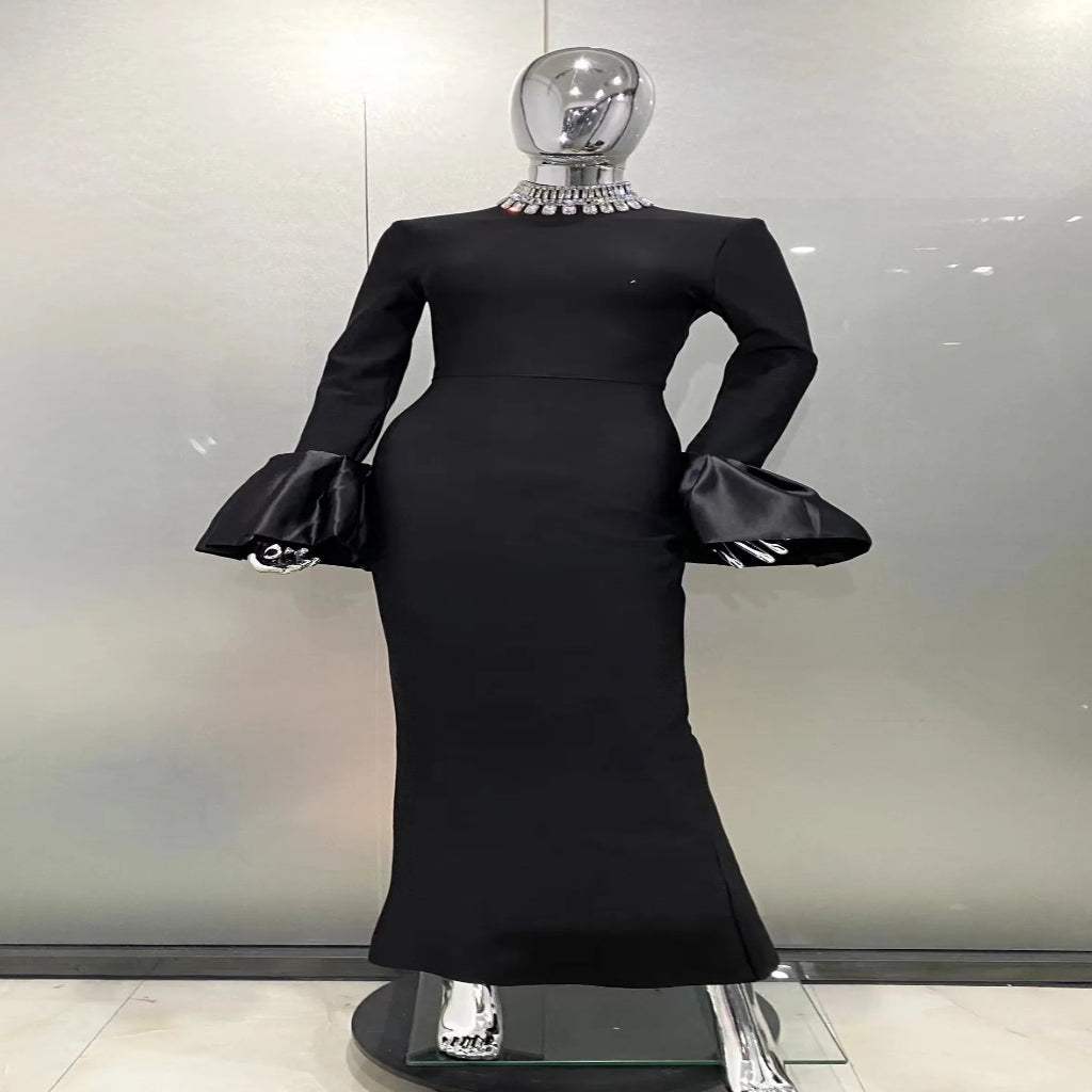 Model wearing elegant black long evening party dress formal style