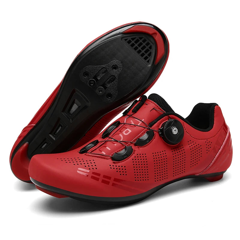 Red cycling shoes with black soles on a white background