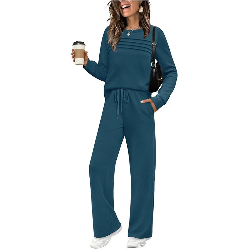 Woman wearing a blue outfit holding a coffee cup on a white background
