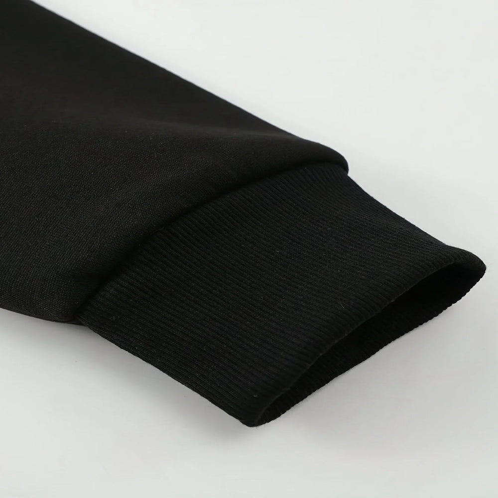 Rolled-up black fabric on a white background