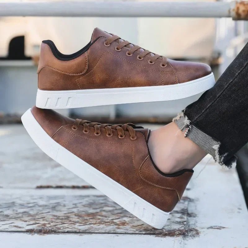 Modern men's PU leather skate shoes with a stylish and durable design.