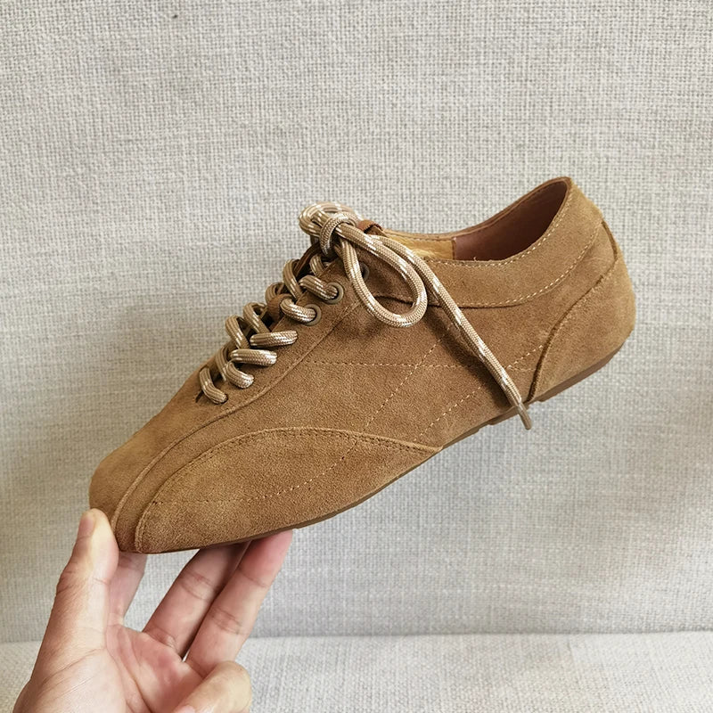 Women's brown suede platform sneakers with cross-tied design