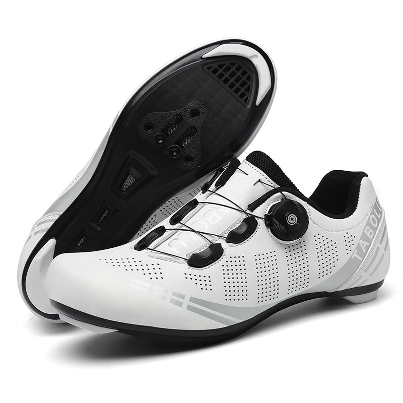 White cycling shoes with black soles on a white background