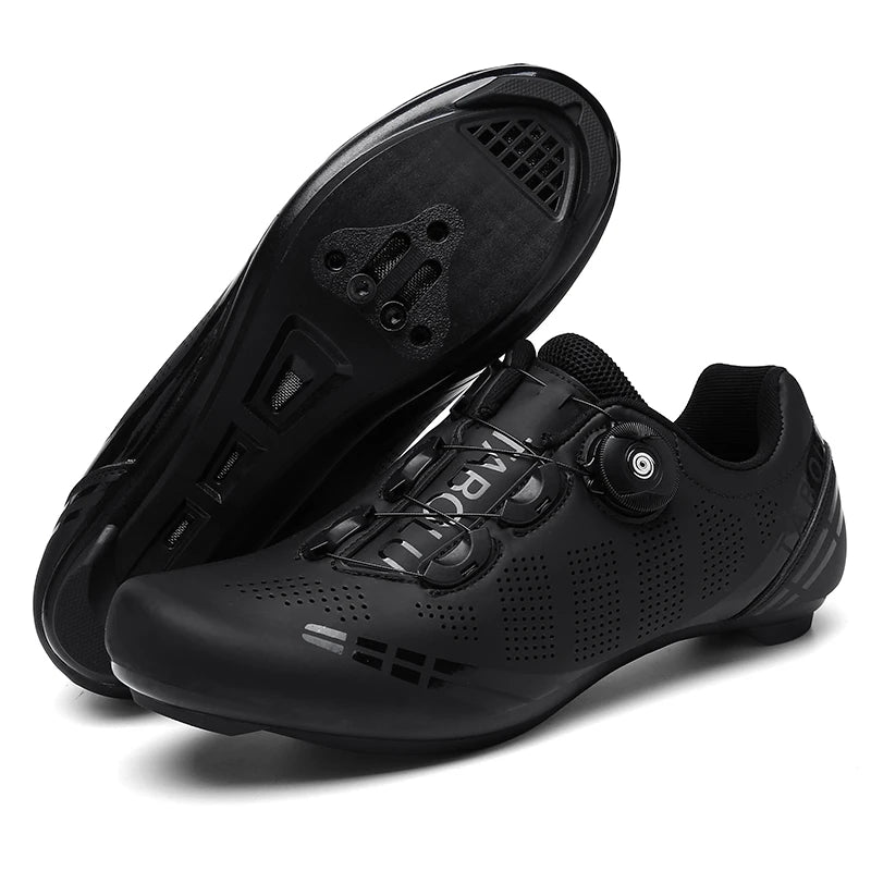 Pair of black cycling shoes on a white background