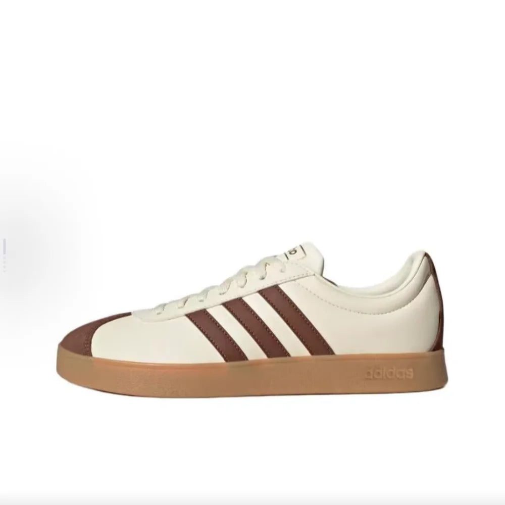White Retro Low Top Sneakers with brown stripes and sole on a white background