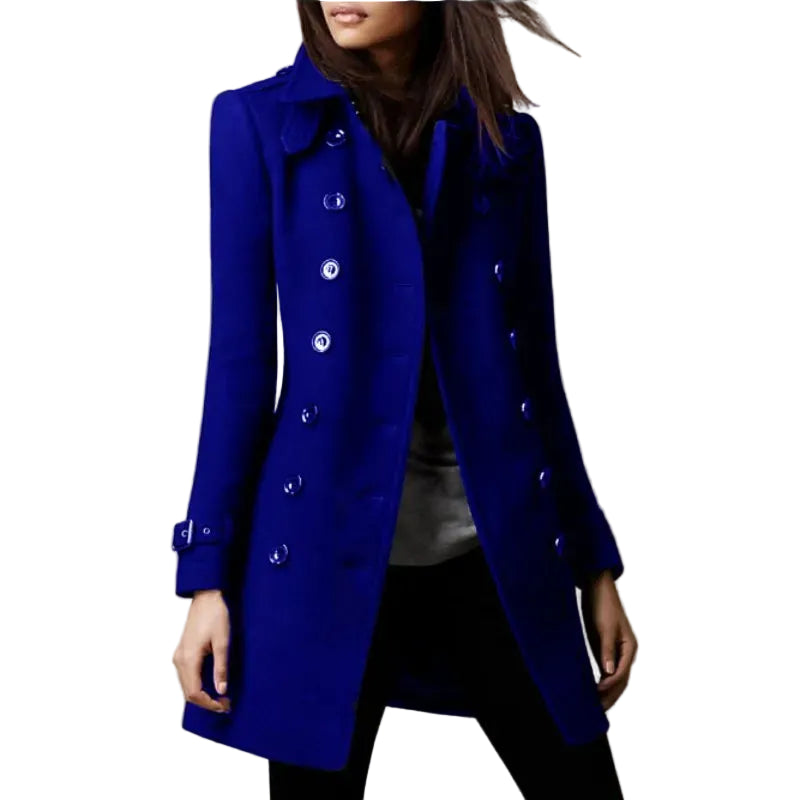 Blue coat worn by a person on a beige background