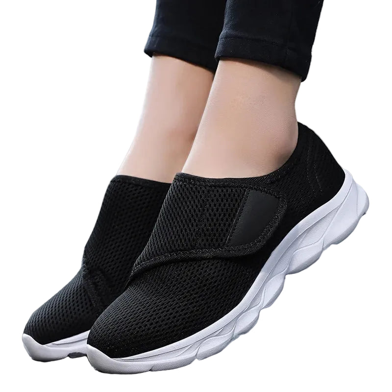 Women's Wide Fit Orthopedic Slip Black color sneakers.
