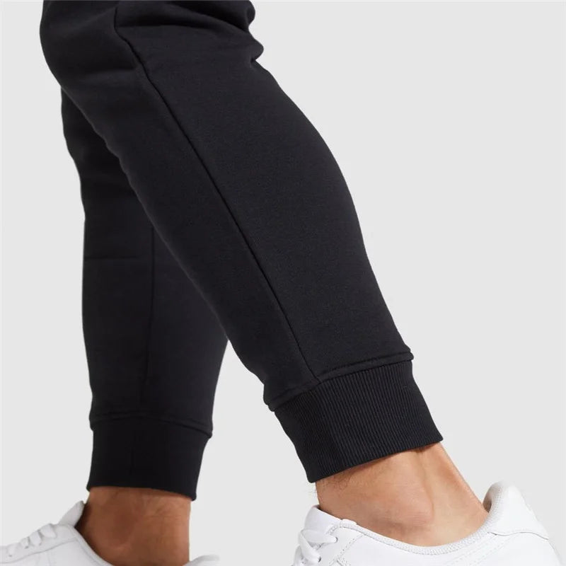Women's jogger sweatpants with cat paw print design – soft cotton blend, ideal for fitness, lounging, and casual wear.