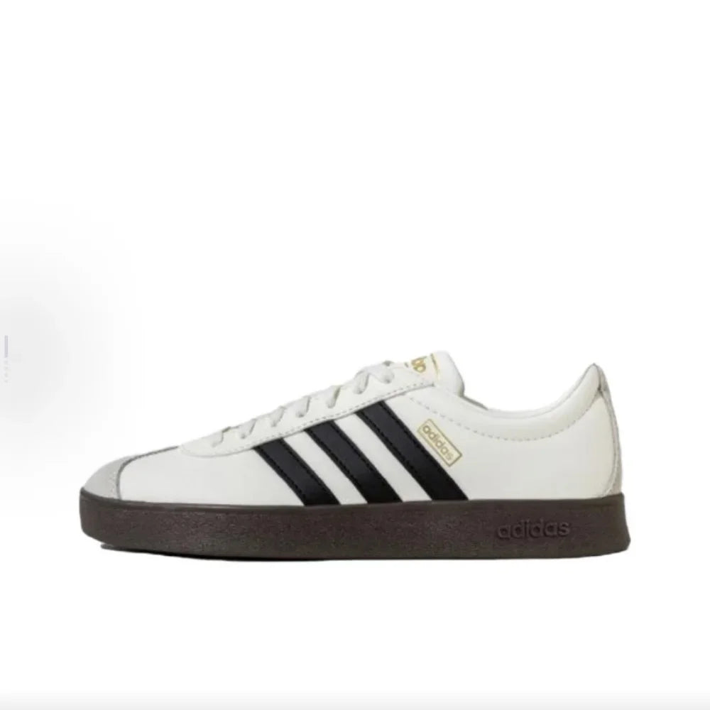 White Retro Low Top Sneakers with black stripes on a white background