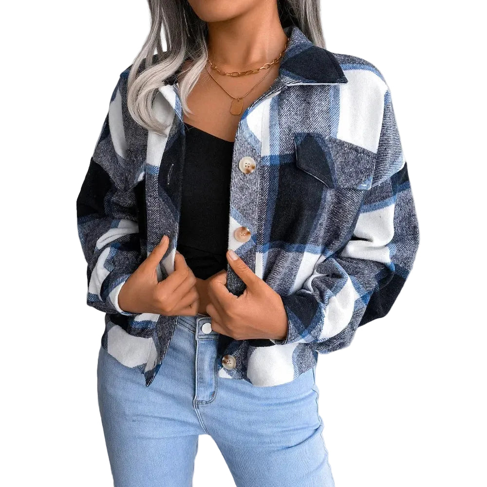 Women's Slim Wool Plaid Coat over a black top and light blue jeans in a minimal indoor setting.