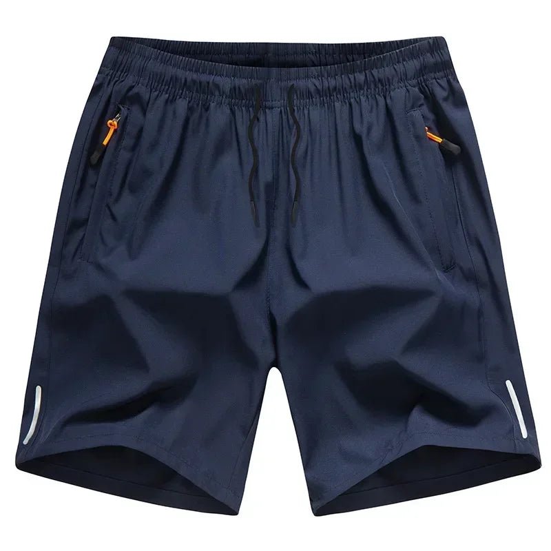 Two pairs of men’s lightweight quick dry shorts in black and grey with zipper pockets and elastic waistband