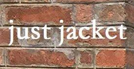 Text 'just jacket' on a brick wall background