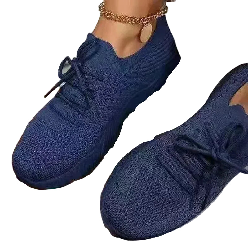 Women's Blue mesh sneakers with matching laces and textured soles at Casual Flow Shop