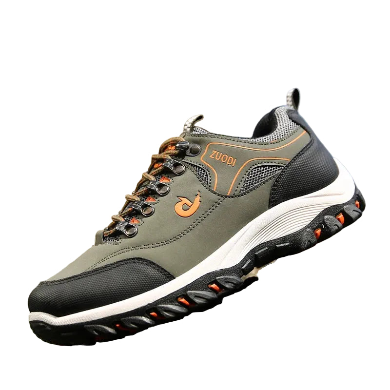 Hiking shoe on a rock with a blurred natural background